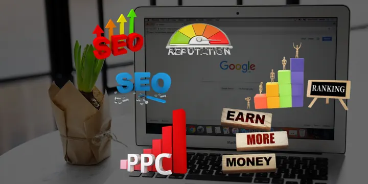 A laptop with SEO and PPC charts